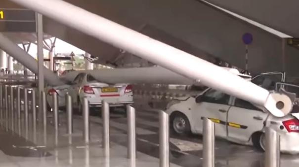 Delhi rains airport roof collapse 6 injured