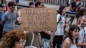 people-of-spain-asking-the-tourists-to-leave