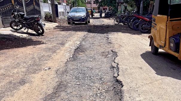 Potholed roads in Madipakkam, Puzhuthivakkam