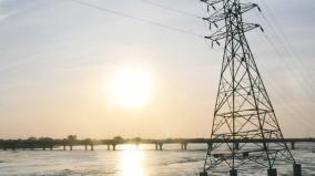 a-high-voltage-tower-leaning-into-kollidam-river