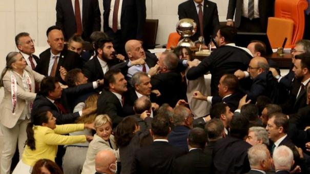 turkey lawmakers draw blood in fist fight during debate on jailed MP