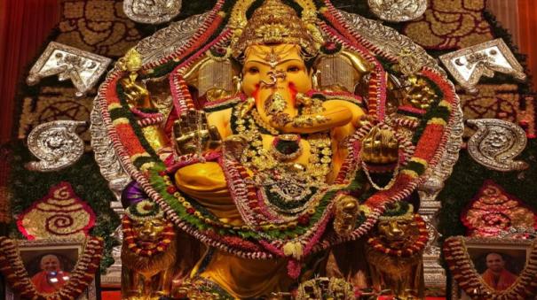 66 kg gold 325 kg silver decoration Ganesha idol Mumbai insured for Rs 400 crore