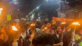 justice-for-assassination-of-doctor-people-carried-torch-light-march