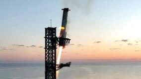 spacex-catches-falling-rocket-booster-on-launchpad