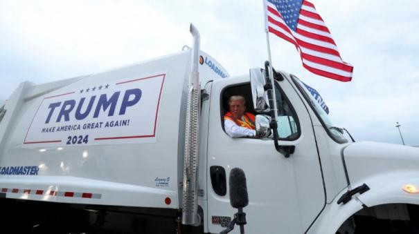 Donald Trump boards garbage truck to draw attention biden remark