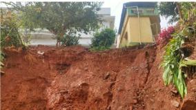 due-to-the-heavy-rains-in-coonoor-the-retaining-walls-have-collapsed-and-the-houses-are-hanging-in-the-gaps