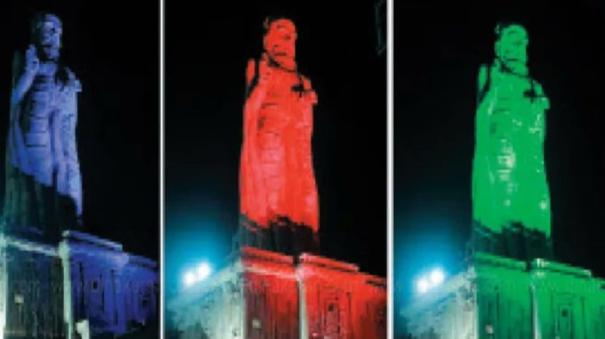 Thiruvalluvar statue shines in laser light at night