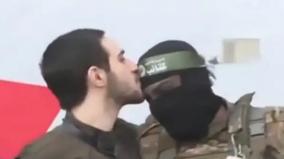 israeli-hostage-bids-farewell-to-hamas-soldiers-by-kissing-forehead