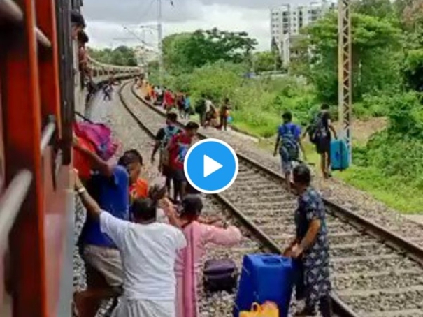 the-woman-tried-to-cross-the-rail-and-escaped-with-her-life