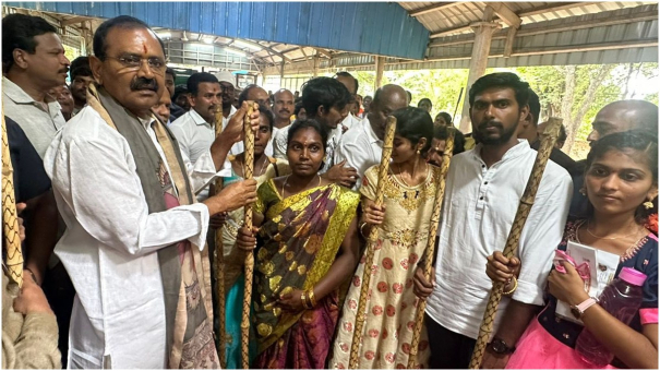 ttd-chairman-distributes-sticks-to-devotees-at-alipiri-walkway