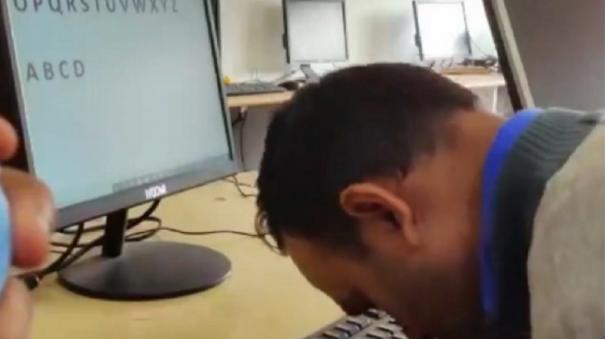 indian-man-typing-alphabet-with-nose-and-breaks-his-own-guinness-world-record