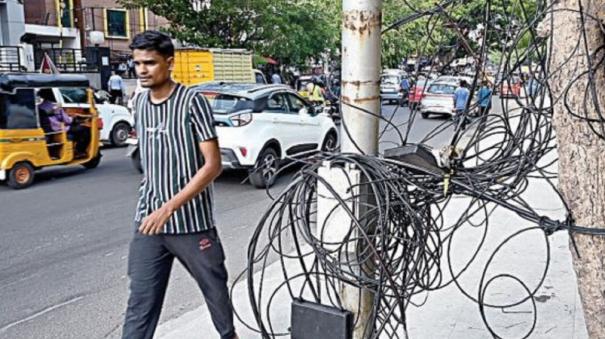 cables-hanging-dangerously-on-the-road-will-chennai-corporation-take-action