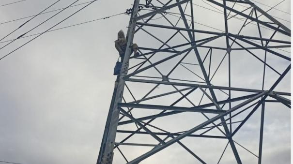 retired-driver-climbs-power-tower-to-protest-for-nomination-rejection-in-vikravandi-by-election