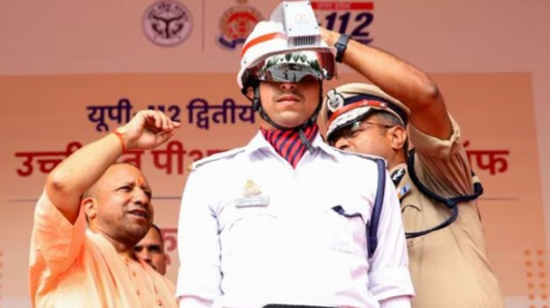 up-cm-yogi-adityanath-distributes-ac-helmet-to-cops