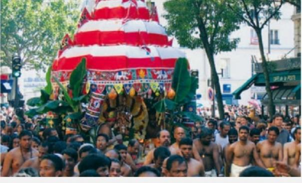 devotees-worship-by-breaking-coconuts-on-the-streets-of-paris