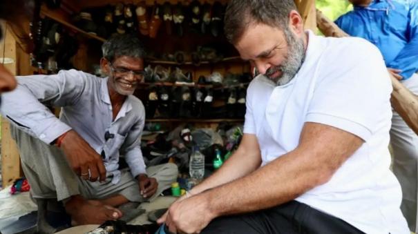rahul-gandhi-meets-local-cobbler-at-sultanpur-tries-his-hand-in-mending-chappal