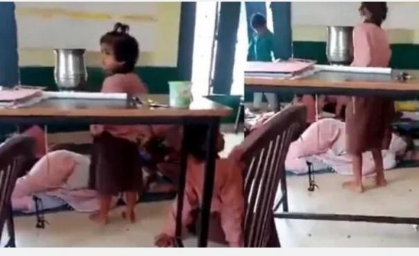 a-video-of-a-teacher-sleeping-in-a-school-in-uttar-pradesh-has-gone-viral