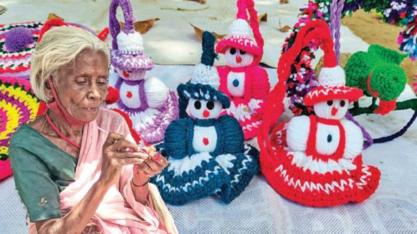 an-old-lady-who-earns-her-own-income-by-making-artistic-items-in-yarn