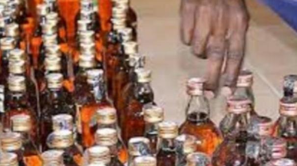 driver-and-conductor-arrested-for-smuggling-liquor-bottles-on-govt-bus-from-puducherry