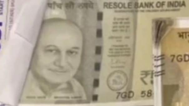 ahmedabad-man-duped-with-fake-notes-featuring-anupam-kher-photo