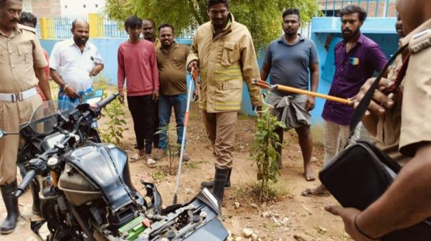 a-snake-lurking-on-the-bike-of-college-student-nearby-srivilliputhur