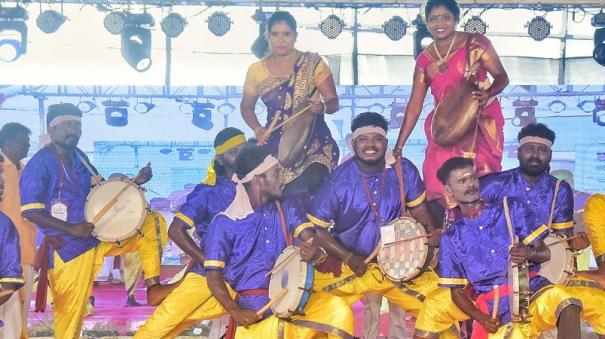 village-artists-dance-enthusiastically-to-the-play-parai-at-kumari-sangam-event-tourists-cheer