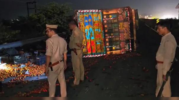 tomato-truck-flips-on-up-highway-overnight-police-watch-to-prevent-theft