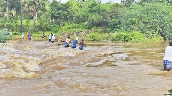 villagers-cross-the-river-by-tying-a-rope-in-dharmapuri